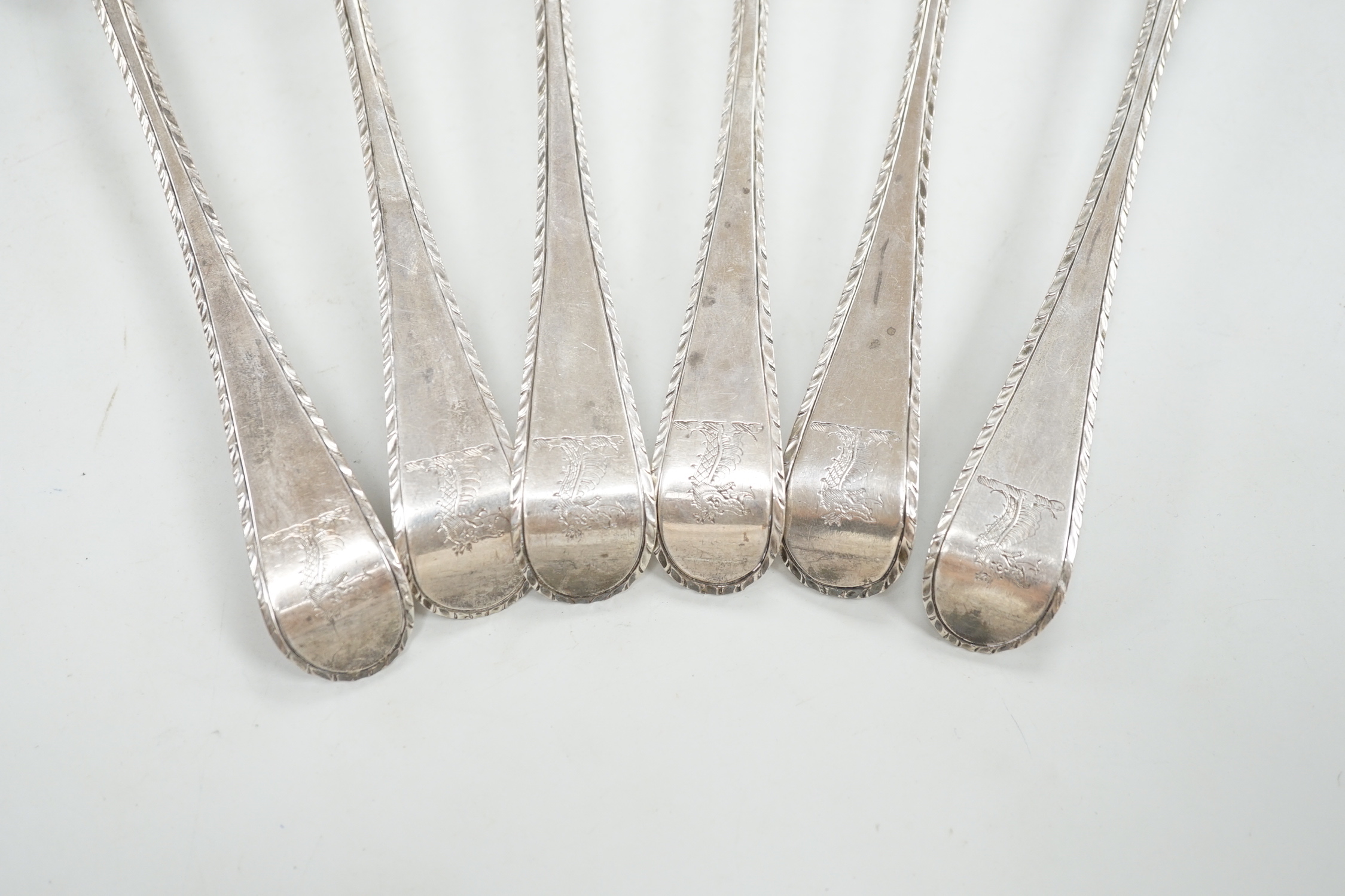 A set of six early George III silver Old English feather edge table spoons, Thompson Davis, London, 1764, 21.3cm, 12.6oz.